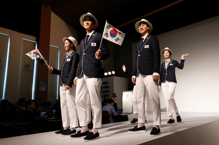 South Korean Olympic athletes and models present the South Korean Olympic team uniforms for the opening and closing ceremonies of the 2016 Rio de Janeiro Olympic Games at Korean National Training Center in Seoul, South Korea, Wednesday, April 27, 2016. South Korea&#039;s Olympic committee on Wednesday unveiled long-sleeved shirts and pants it says will help protect the country&#039;s Olympic athletes from the mosquito-borne Zika virus at this year&#039;s games in Rio de Janeiro. (AP Photo/Lee Jin-man)