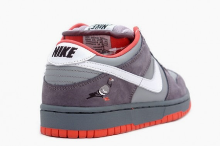 A shot of the Staple Pigeon Dunk, showing off the embroidered pigeon on its heel.