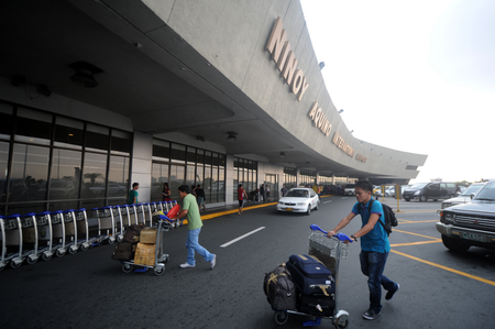 Passengers arrive at the Ninoy Aquino In