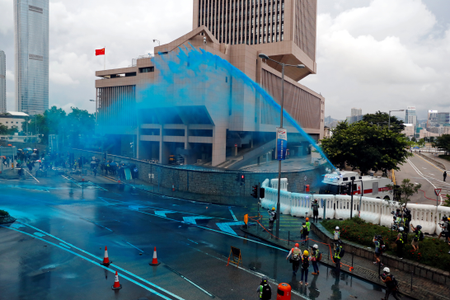Riot police use water cannon to disperse anti-extradition bill demonstrators during a protest in Hong Kong, China, August 31, 2019.