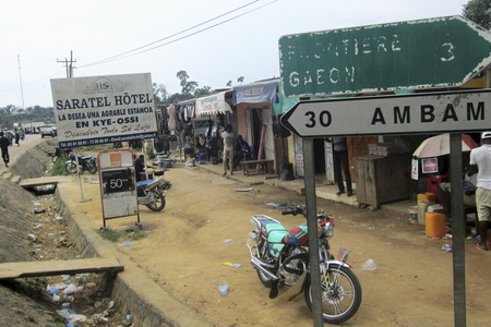Signs are seen on the border with Equatorial Guinea and Gabon in Kye-Ossi