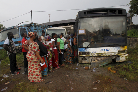 A bus is used as a polling station in Conakry, Guinea during the 2015 presidential election.