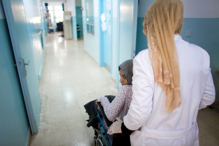 Girl in wheelchair in surgical ward