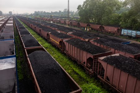 Wagons loaded with coal wait at the yards in Korba Railway Station.