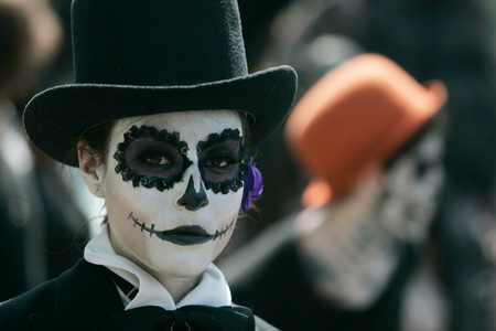 A fine arts student wears make-up during the Catrina&#039;s parade in Guadalajara October 26, 2012. Students of fine arts took part in their Catrina&#039;s parade as part of the celebrations for the Day of the Dead, local media reported. La Catrina, a popular figure in Mexico known as &quot;The Elegant Skull&quot;.