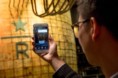 An augmented reality app is used in the new Starbucks Roastery in Shanghai, China.