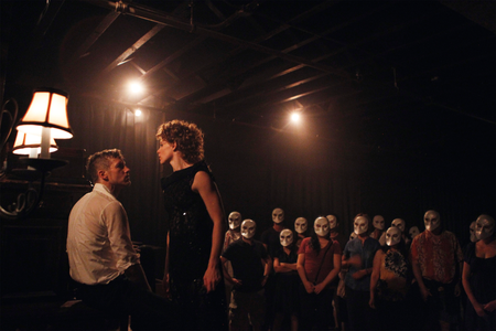 Actors perform the parts of Macbeth and Lady Macbeth in a production of &quot;Sleep No More&quot; in New York July 25, 2011.