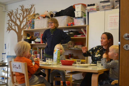 Marjatta Ahonen serves lunch with Maileena Nieminen