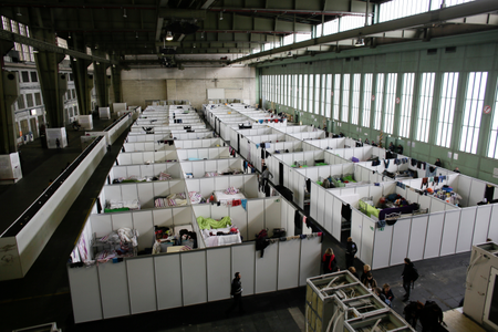 Temporary sheltesr for migrants are set up inside a hanger at Tempelhof in 2015.