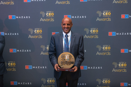 Tewolde GebreMariam receiving the &quot;African Champion of the Year&quot; award at the Africa CEO Forum in Kigali