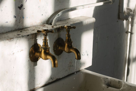Detailed photograph of the taps in Charles Rennie Mackintosh building&#039;s loggia