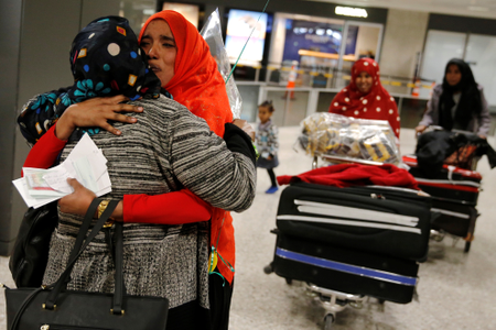 Najmia Abdishakur (2nd L), a Somali national who was delayed entry to the U.S. because of the recent travel ban, is greeted by her mother Zahra Warsma (L) at Washington Dulles International Airport in Chantilly, Virginia, U.S. February 6, 2017.