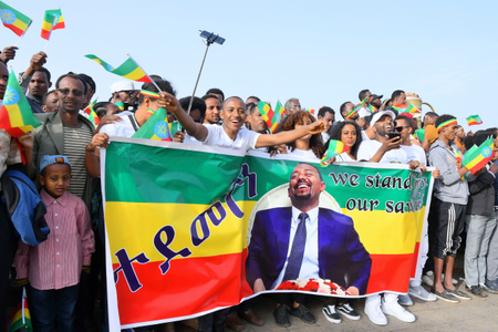 Suporters of Ethiopian Prime Minister Abiy Ahmed cheer just before an explosion rocked a massive rally to support him in Meskel Square in Addis Ababa, Ethiopia, 23 June 2018. Reports say the blast occurred shortly after Abiy addressed thousands of his supporters. Abiy says a few people have been killed. Explosion rocks a rally in Ethiopia, Addis Ababa - 23 Jun 2018