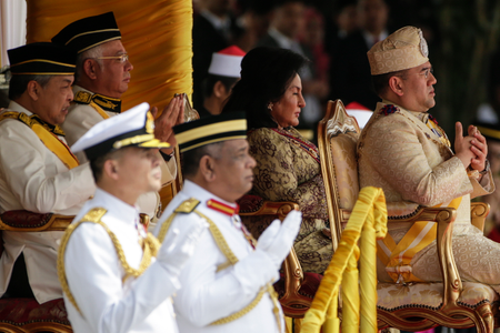 Malaysia&#039;s new King, Sultan Muhammad V (R), Malaysian Prime Minister Najib Razak (2-L) and deputy Prime Minister Zahid Hamidi (L) pray during the official welcoming ceremony at Parliament Square, in Kuala Lumpur, Malaysia, 13 December 2016. Sultan Muhammad V is the 15th Malaysian King. The appointment is rotated among nine of Malaysia&#039;s 13 states that have hereditary royal rulers. EPA/FAZRY ISMAIL