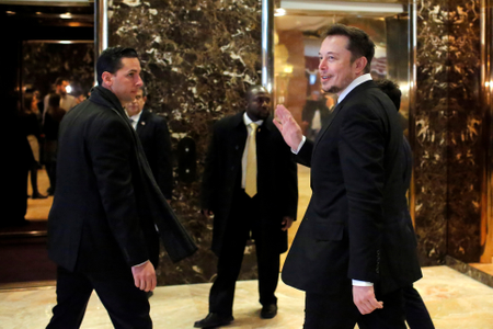 CEO at Tesla Elon Musk enters Trump Tower ahead of a meeting of technology leaders with President-elect Donald Trump in Manhattan, New York City, U.S., December 14, 2016. REUTERS/Andrew Kelly - RTX2V2RH