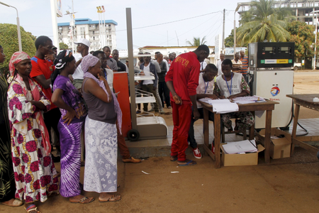 A petrol station in Conakry is turned into a polling station.