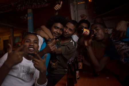 Young people at a karaoke bar in Manakara