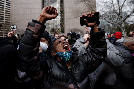 A person reacts after the verdict in the trial of former Minneapolis police officer Derek Chauvin, in the death of George Floyd, in front of Hennepin County Government Center, in Minneapolis, Minnesota,