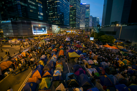 Protesters and tents occupy the main road to the financial Central district during the one month anniversary of the Occupy Central civil disobedience movement, in Hong Kong October 28, 2014.