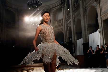 A model presents a creation from the Fall/Winter 2016/2017 Haute Couture collection by Dutch designer Iris Van Herpen during the Paris Fashion Week, in Paris, France, 04 July 2016. The presentation of the Haute Couture collections runs from 03 to 07 July. EPA/ETIENNE LAURENT