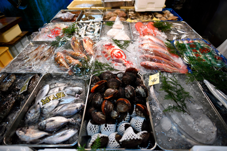 ATTENTION: This Image is part of a PHOTO SET Mandatory Credit: Photo by FRANCK ROBICHON/EPA-EFE/REX/Shutterstock (9899123l) Local fish and shellfish are on sale at the Tsukiji fish market in Tokyo, Japan, 02 March 2018 (issued 28 September 2018). The inner market of Tsukiji, considerate to be the biggest fish market of the world, will close to the public on 29 September before closing permanently on 06 October after 83 years of operation at its actual location to move to new facilities in Toyosu. Tsukiji fish market in Tokyo, Japan - 02 Mar 2018