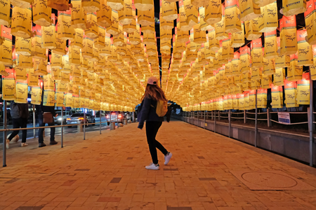 Walking under paper lanterns