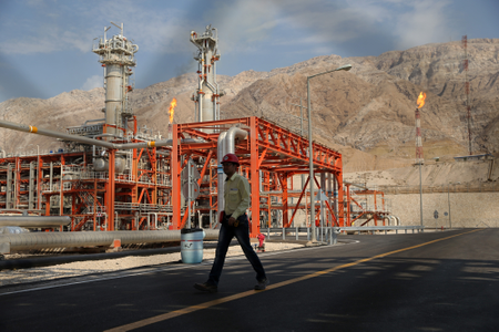 A worker makes his way in a natural gas refinery in the South Pars gas field in Asalouyeh, Iran.