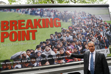 Leader of the United Kingdom Independence Party (UKIP) Nigel Farage poses during a media launch for an EU referendum poster in London, Britain June 16, 2016.