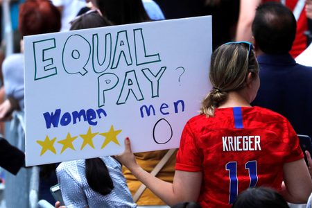 Women&#039;s World Cup Champions Parade - New York, United States - July 10, 2019 A fan displays a sign during the parade.