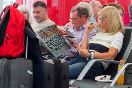 British passengers wait for news on cancelled Thomas Cook flights at Palma de Mallorca airport on Sept. 23