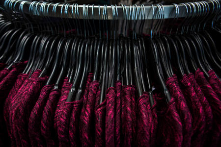 Sweaters are seen on a rack at H&amp;M on Thanksgiving Day in New York November 28, 2013. While most in the United States spent the day bonding with friends and family over turkey dinners and football games, some were enticed by big discounts and open stores to begin their holiday bargain-hunting a day earlier than the traditional &quot;Black Friday&quot; sprees that follow Thanksgiving. REUTERS/Eric Thayer (UNITED STATES - Tags: BUSINESS) - RTX15X41