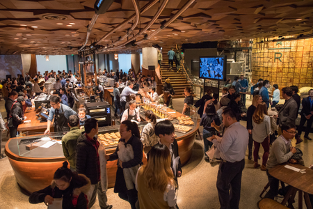Guests explore the new Starbucks Roastery in Shanghai, China on Sunday, December 3, 2017.