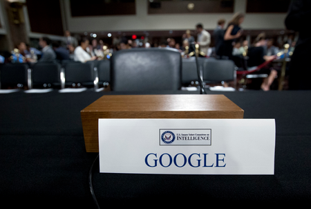 FILE- In this Sept. 5, 2018, file photo an empty chair reserved for Google&#039;s parent Alphabet, which refused to send its top executive, is seen before the Senate Intelligence Committee hearing on Capitol Hill in Washington. Momentum is gaining in Washington for a privacy law that would sharply reduce the ability of the largest technology companies to collect and distribute people’s personal data. Behind the drive for a law is rising concern over private data being compromised or distributed by Facebook, Google and other tech giants that have earned riches from marketing consumer information. (AP Photo/Jose Luis Magana, File)