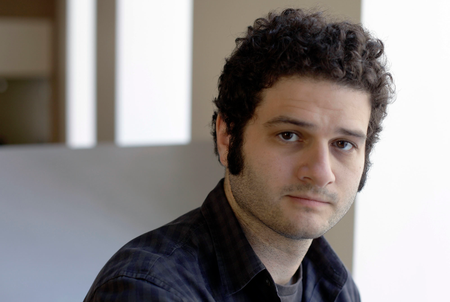 FILE-In this April 26, 2012 file photo, Dustin Moskovitz, a Facebook co-founder, poses outside of his office in San Francisco. Moskovitz says he is giving $20 million to help defeat Donald Trump, calling the Republican presidential candidate divisive and dangerous and his appeals to Americans who feel left behind &quot;quite possibly a deliberate con.&quot; (AP Photo/Eric Risberg)