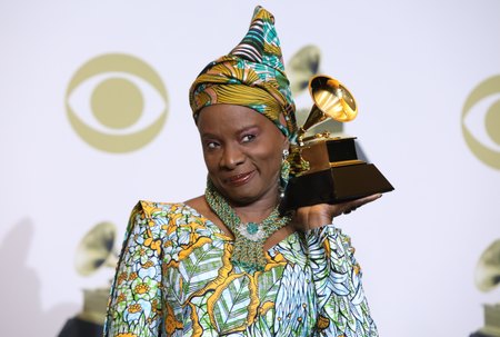 Angelique Kidgo holds her 2022 Grammy award