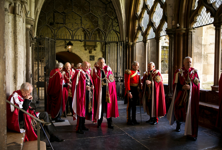 Sir Derek Oulton (L) sits alongside other Knights as they muster in the Abbey cloisters before the arrival of Britain&#039;s Queen Elizabeth for a Service of the Order of the Bath at Westminster Abbey in London May 9 , 2014. The service is held every four years and attended by the Prince of Wales, while the Queen attends every second service.