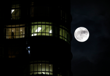 The moon rises next to the Unicredit Tower in Milan, Italy, Monday, Nov. 14, 2016. The brightest moon in almost 69 years lit up the sky, during its closest approach to earth as the &quot;Supermoon&quot; reached its most luminescent phase. The moon won&#039;t be this close again until Nov. 25, 2035.