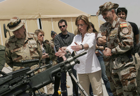 Spain&#039;s Defence Minister Carme Chacon, second right, gestures as she meets Spanish troops who are part of the International Security Assistant Force (ISAF) after she arrived in Herat province southwest of Kabul, Afghanistan
