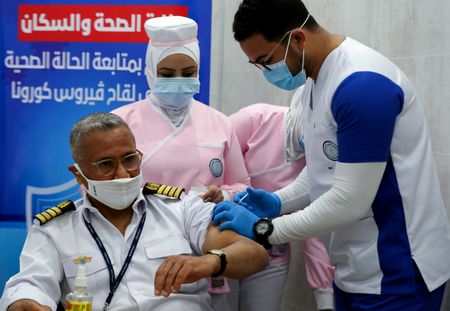 A member of Suez Canal captains receives a Covid-19 vaccine in Ismailia in April.