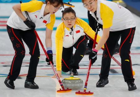 Curling - Pyeongchang 2018 Winter Olympics - Women&#039;s Round Robin - Sweden v China - Gangneung Curling Center - Gangneung, South Korea - February 21, 2018 - Wang Bingyu of China watches as team mates sweep. REUTERS/Phil Noble