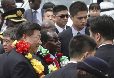 Chinese president Xi Jinping with Zimbabwean President Robert Mugabe in Harare, Zimbabwe on December 1, 2015.