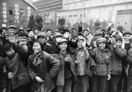 Young Chinese gathered outside a factory waving copies of the collected writings of Mao Zedong in 1967.