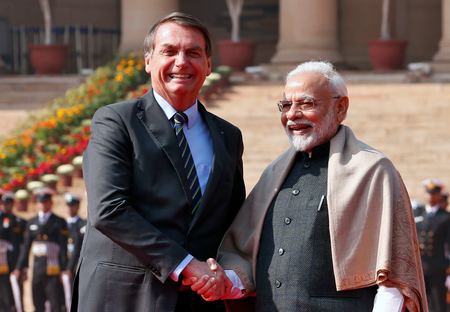 Brazil&#039;s President Bolsonaro shakes hands with India&#039;s Prime Minister Modi during his ceremonial reception at the forecourt of India&#039;s Rashtrapati Bhavan Presidential Palace in New Delhi