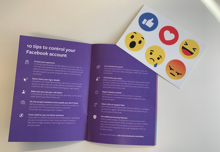 Facebook&#039;s tips book and stickers.