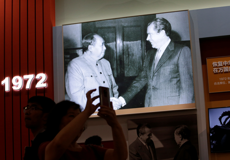 Visitors are seen in front of exhibits showing the U.S. president Richard Nixon&#039;s 1972 visit to China, during an exhibition on China&#039;s achievements marking the 70th anniversary of the founding of the People&#039;s Republic of China (PRC) at the Beijing Exhibition Center, in Beijing, China September 24, 2019.