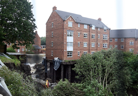 A view of the block of apartments which have there foundations washed away from the heavy flood waters in Newburn, near Newcastle, England