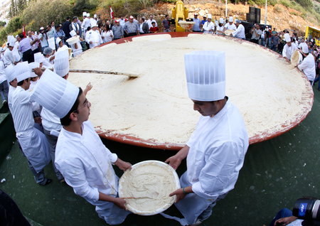 Lebanese chefs work to beat Israel&#039;s record for largest bowl of hummus, unaware that now it&#039;s all made in Virgnia, anyway
