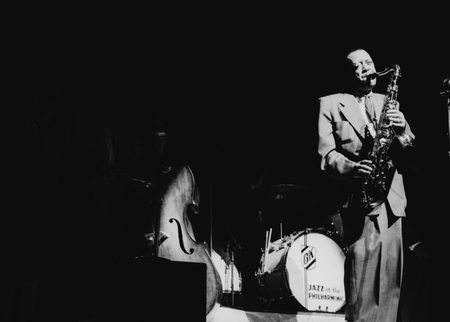 American tenor saxophonist Lester Young (1909 - 1959) playing at a charity concert held at the Philharmonic Hall, August 1953