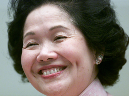 Hong Kong Chief Secretary Anson Chan smiles during a news conference announcing her resignation in Hong Kong January 12, 2001. [Chan&#039;s departure signals the most significant government change since Britain returned the rich capitalist outpost to communist China in mid-1997 after more than 150 years of colonial rule.