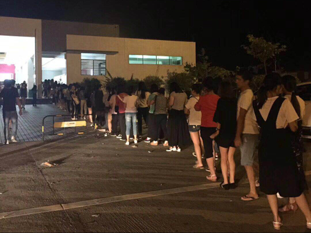 Queueing up for the restrooms at 3 a.m in a resting spot on the expressway connecting Guangzhou to Heyuan.
